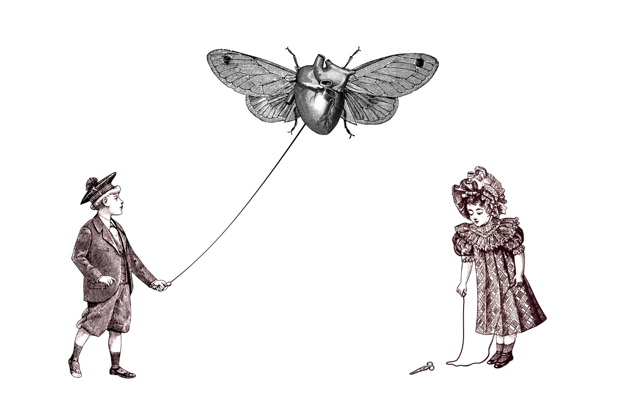 Boy and girl holding strings beneath a flying anatomical heart with insect wings